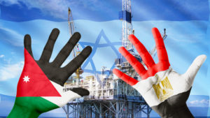 ידיים צבועות בדגלים של ירדן ומצרים על רקע אסדת גז עם דגל ישראל